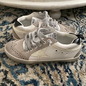 Sarabasics Collection star wingtip sneakers.